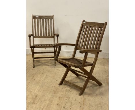A pair of slatted teak folding garden chairs H99cm