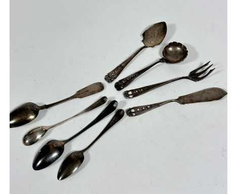 A Victorian Fiddle pattern teaspoon, a Georgian mustard spoon, two various Georgian teaspoons and a set of four African white