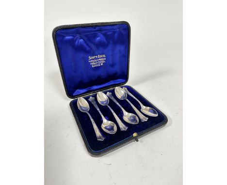 A set of six Victorian Birmingham 1893 silver leaf style handled coffee spoons (53.4g) in original fitted case by Scott Adie 