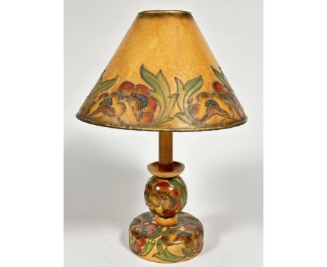 A 1920s birch wood table lamp with original card tube lined and painted shade and matching ball and circular moulded base, in