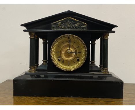 A late 19th century American black painted metal mantel clock of architectural form, the gilt dial with Roman chapter ring, e