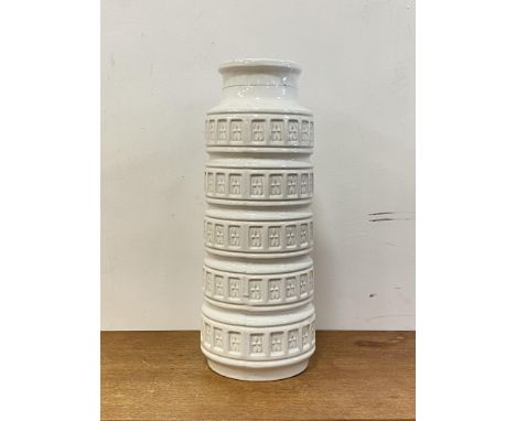 A West German white glazed ceramic vase with fluted bands and square rosette motif, H52cm