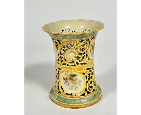 A Zsolnay Pecs Hungarian porcelain pierced cylinder vase decorated with scrolling design and floral sprays with flared rim an