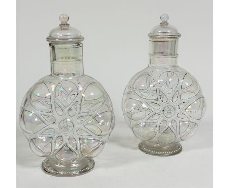 A pair of Edwardian clear lustre and black enamelled white dotted outlined moon style flask vases with domed covers and circu