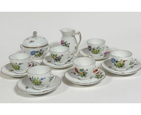 A Danish Bing &amp; Grondahl fourteen piece coffee service comprising six cups, six saucers, sugar basin with cover, and milk