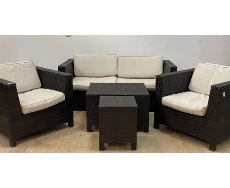 A rattan garden suite, comprising a two seat sofa (H66cm, L165cm, D80cm) a pair of chairs (W80cm) a coffee table (74cm x 64cm