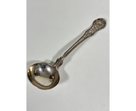 A Georgian silver shaped sauce ladle with chased rose and leaf design with fan shell chased rear bowl, marks badly rubbed, (L