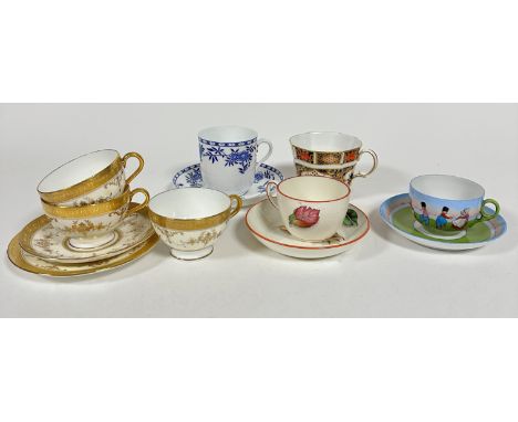 A Wedgwood creamware cup and saucer, decorated with handpainted enamel leaf sprays with ochre lined border, (cup: 6cm x 8cm) 