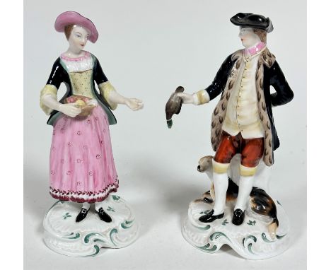 A pair of Spode Chelsea style porcelain figures of a huntsman, dog and quarry, raised on socle style base and a lady with a b