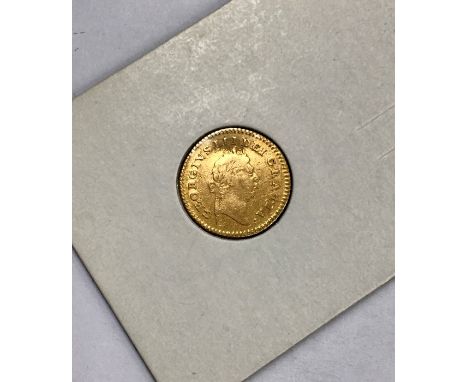 George III, third of a Guinea 1798.Condition, wear to high points with small scratches to surface, small dent just above port
