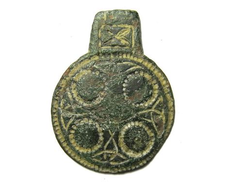 Saxon Terminal. Circa, 7th century. Copper-alloy, 3.77 grams. 35.14 mm. An Anglo-Saxon terminal formed of a circular panel wi