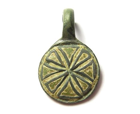 Saxon Hanging Bowl Mount.Circa, 7th century AD. Copper-alloy, 9.29 grams. 36.20 mm. A nice example of this type formed of a p