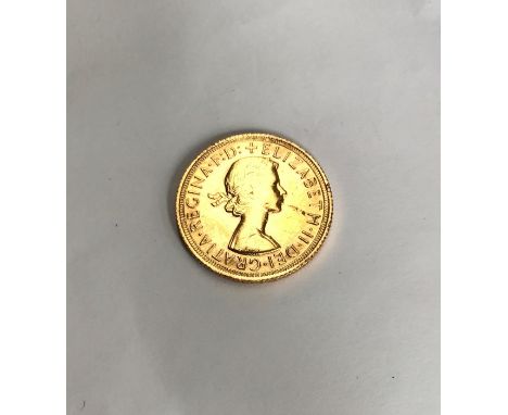 Elizabeth II 1968 full Sovereign.Condition, slight wear to high points with very small scratches to surface with deeper scrat