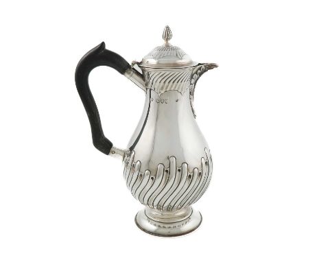 A late-Victorian silver hot water pot,by William Hutton &amp; Sons Ltd, London 1894,baluster form, embossed with part-fluted 