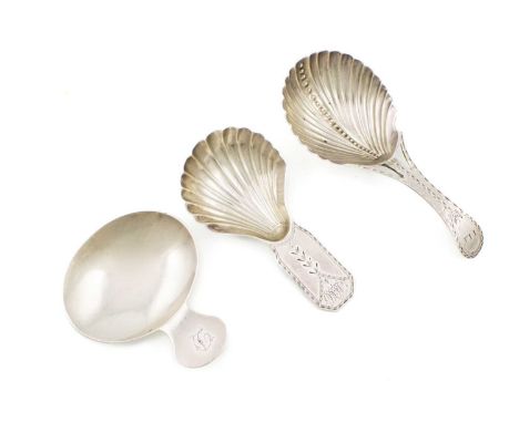 A small collection of three George III silver caddy spoons, comprising: one by William Brockwell, London 1786, bifurcated bri