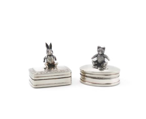 Two modern silver tooth boxes, maker's mark D.D, London 2000, oval and rectangular form, the covers mounted with a teddy bear