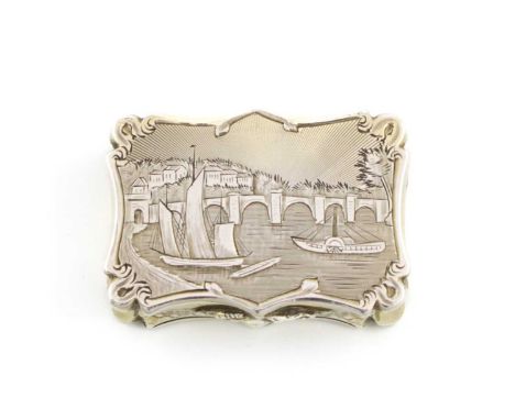 A Victorian silver vinaigrette,by Nathaniel Mills, Birmingham 1846,shaped rectangular form, with traces of gilding, the hinge