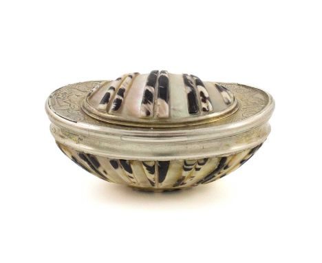 An 18th century silver-mounted shell snuff box,unmarked,the mounts are decorated with reeded decoration, the hinged cover is 