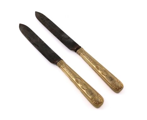 A pair of George III silver-gilt handled King's Pattern carving knives, by Paul Storr, London 1809, with engraved crests to t