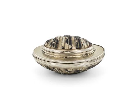 An 18th century silver-mounted shell and mother-of-pearl double snuff box,unmarked,oval form, reeded decoration to the mounts