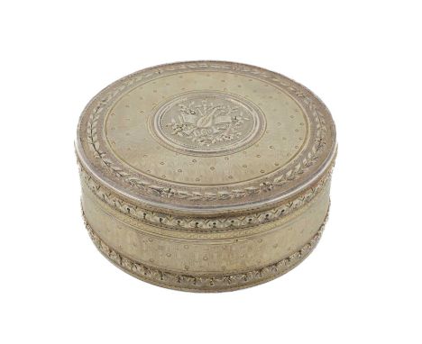 A 19th century French silver-gilt snuff box,  circa 1850, circular form, foliate borders with engine-turned decoration, the p