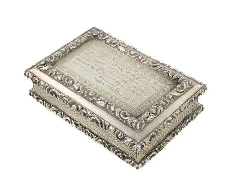 A William IV silver presentation snuff box, by Nathaniel Mills, Birmingham 1834, rectangular form, chased scroll foliate bord