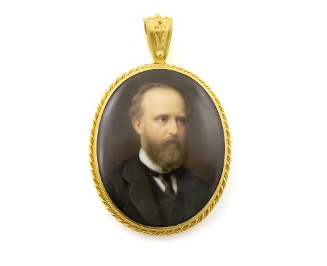 A Victorian gold-mounted enamel pendant, unsigned, circa 1880,oval form, enamelled portrait of a gentleman in a grey suit on 