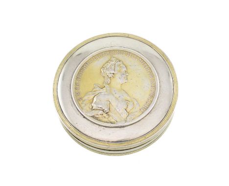 An 18th century Russian silver parcel-gilt silver snuff box, unmarked, circa 1775,circular form with reeded borders, the pull