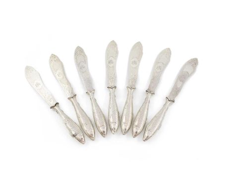 A matched set of seven Victorian silver fish knives,Martin, Hall &amp; Co, Sheffield 1867,1868, 1869,the handles are modelled