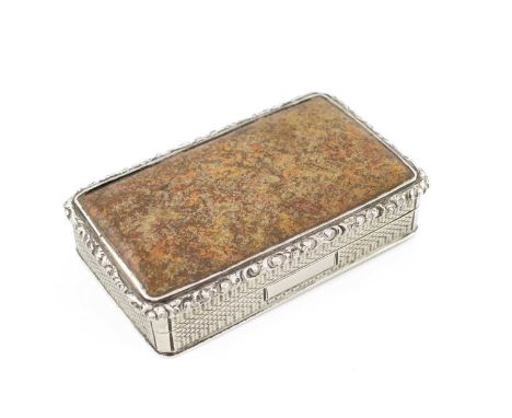 A William IV silver and agate snuff box,by Edward Smith, Birmingham 1835,rectangular form, a foliate scroll border with engin