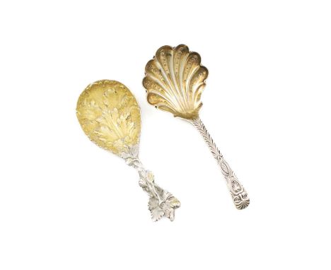 A Victorian cast silver caddy spoon, by George Adams, London 1862, gilded foliate bowl, foliate handle, plus a William IV sil