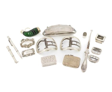 A mixed lot of silver objects of vertu,comprising: four buckles, two vesta cases, two wine labels, a button hook, a cigar pie