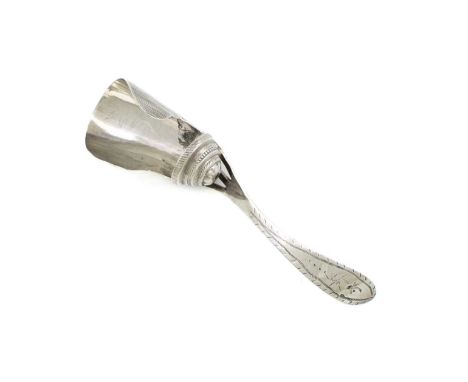 A 19th century Dutch silver caddy spoon,Schoonhoven 1943,reeded shovel bowl, engraved handle, the underside inscribed 'L. Alm