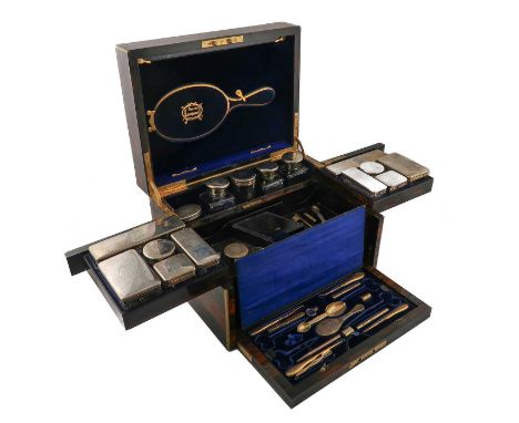 A Victorian silver travelling dressing table set,by Frederick Purnell, London 1878,plain mounts, engraved with initials, clea