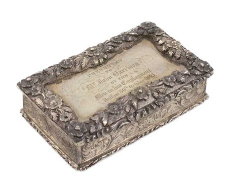 A Victorian silver presentation snuff box,by John Tongue, Birmingham 1841,rectangular form, foliate borders with engraved scr