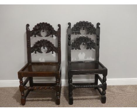 A near matched pair of 17thC oak Side Chairs, Yorkshire/Derbyshire style with an arched top rail and corresponding horizontal