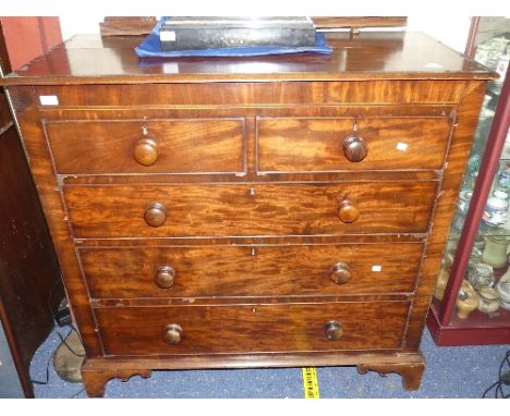 A Victorian mahogany Chest of Drawers, two short over three long, bracket feet and knob handles, split to top, one side mould