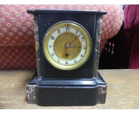 A Victorian slate Mantle Clock, 8in (20cm) wide, 5in (12.5cm) deep, 9in (23cm) high.