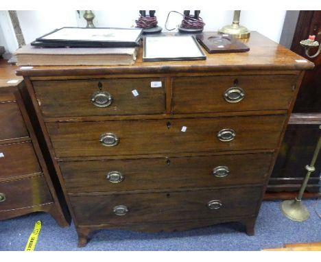 A Georgian mahogany Chest-of-Drawers, two short and three long drawers with ebony stringing and key escutcheons, later brass 