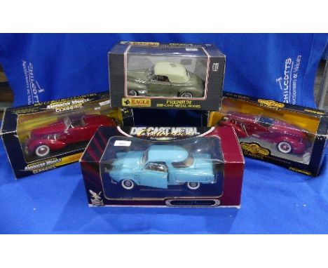 Four 1:18 scale die-cast Models, including two 'American Muscle Classic', the 1937 Cord 812 Convertible and the 1935 Auburn, 