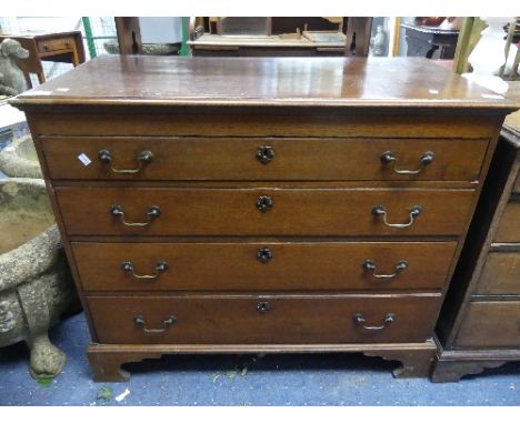 A Georgian oak Chest of Drawers, with four graduated long drawers, all raised on bracket feet, 40in (105.5cm)  wide x 19½in (