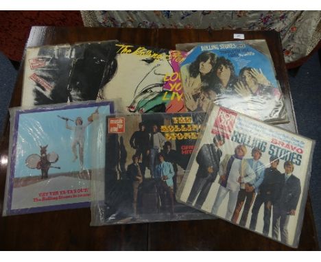 Vinyl Records; A collection of six Rolling Stones LP's, including 'Sticky Fingers' CoC 59100, zip sleeve, 'Through the past d