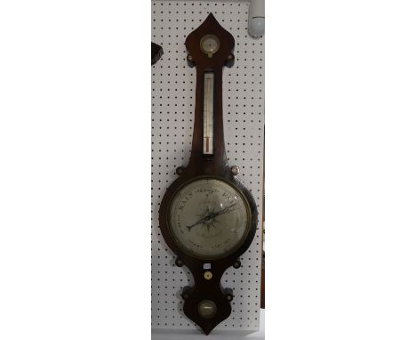 A Victorian rosewood wheel Barometer, the silvered dial signed D. Fugioli &amp; Son, 3 Gt. Warner Street, Clerkenwell, 40in (