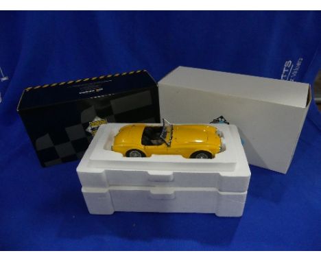 An Exoto 'Racing Legends' series 1:18 scale model of the 1964 Shelby Cobra 260, yellow, in original polystyrene packed box an