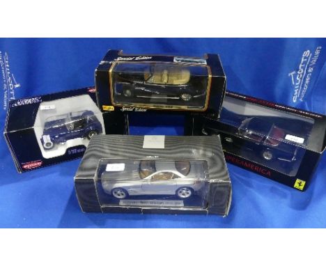 Four 1:18 scale die-cast Models, including the Shelby Cobra 427S/C by Kyosho, the BMW 502 by Maisto, the Ferrari 410 Superame