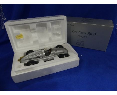 A CMC 1:18 scale model of the 1938-1939 Auto-Union Typ D, in original polystyrene packed box, model appears mint except missi