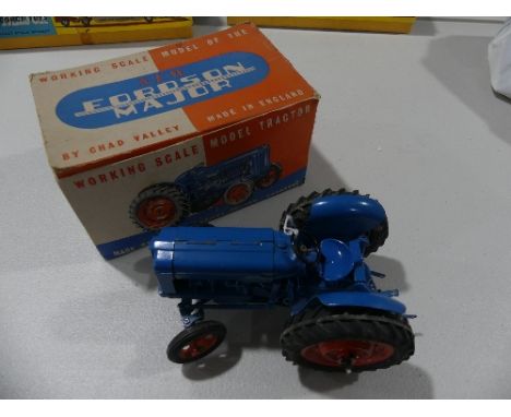 A Chad Valley New Fordson Major Tractor, clockwork, blue with Chad Valley label on the drawbar, boxed.