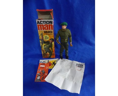 Action Man; A boxed 1970's Soldier Figure, with blond flock head and gripping hands.