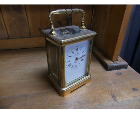 A 20th century French gilt brass Carriage Clock, signed L'Epée, Sainte-Luxanne, France, of traditional 5-glass form, with 11-