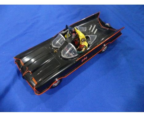 Batman; A large (1:12 scale) plastic model by Mattel of The Batmobile, complete with Batman and Robin figures.
